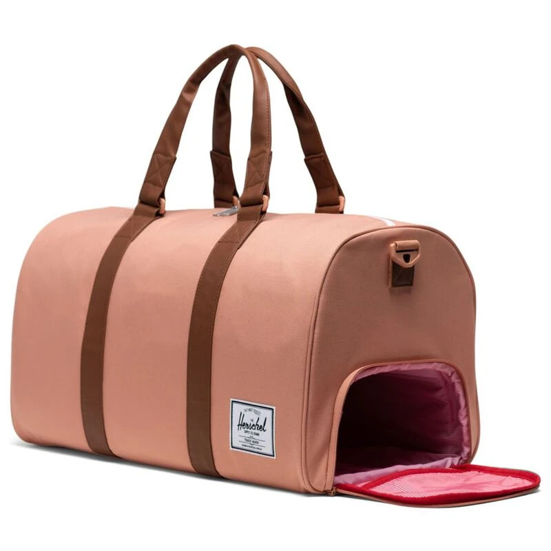 Pink herschel duffle bag deals